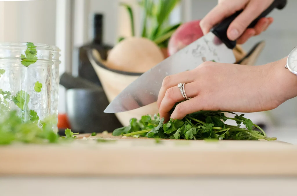 Cooking at home: cutting vegetables 