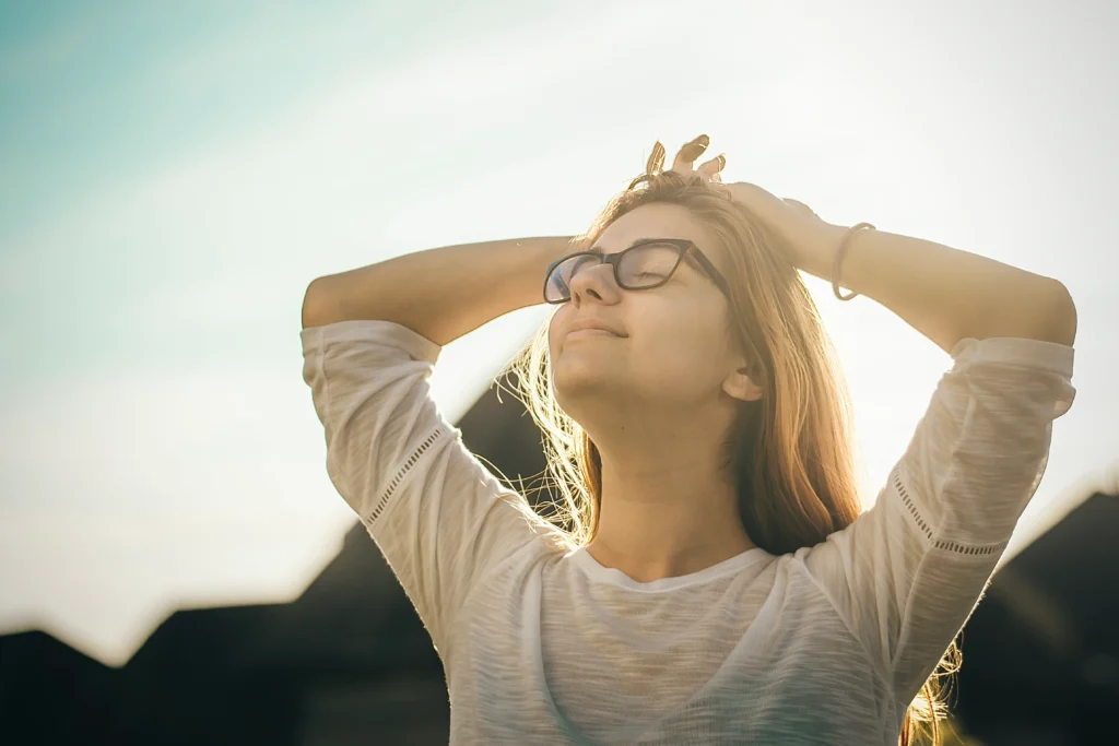 Smiling girl under the sun - Exploring Mind and Body Connection