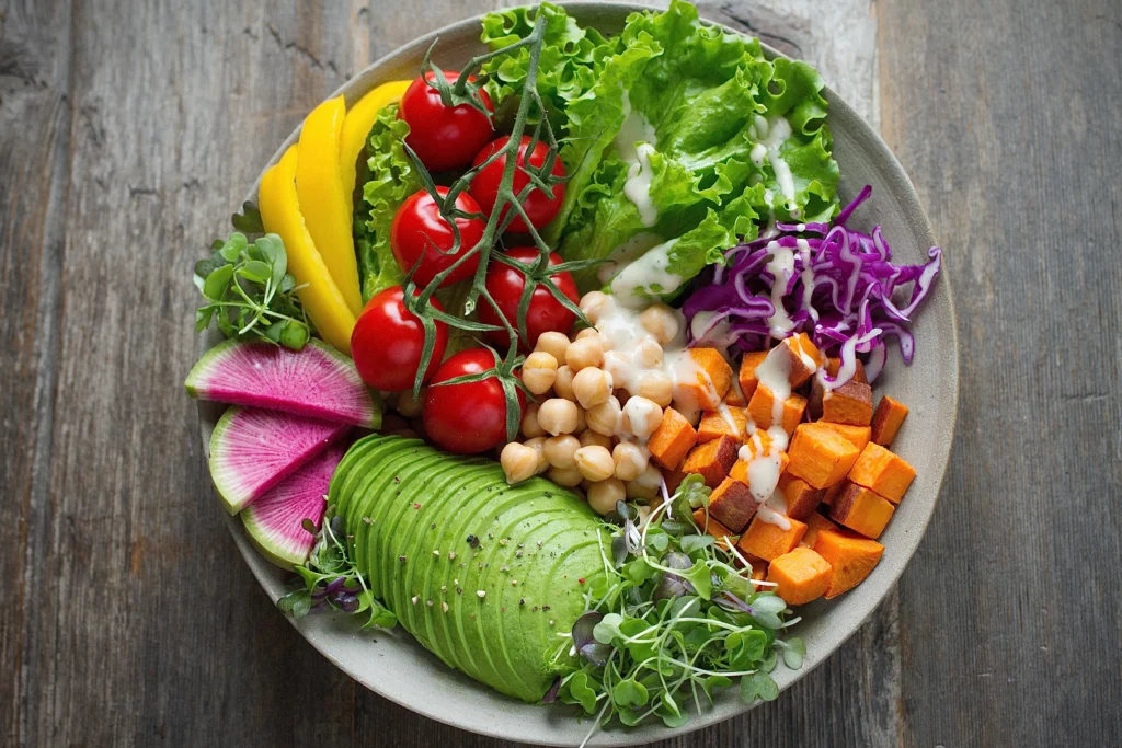 Vegan Connection: Colorful plate of fruits, vegetables, legumes