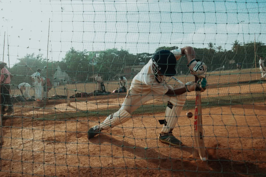 Middle school students practicing cricket